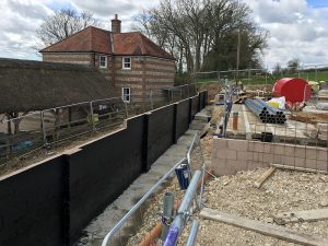 Tanking complete on south retaining wall at Tolpuddle